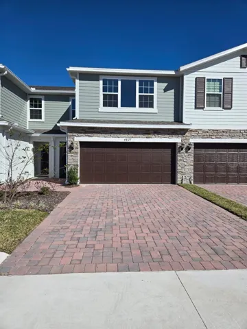Front with big drive way.