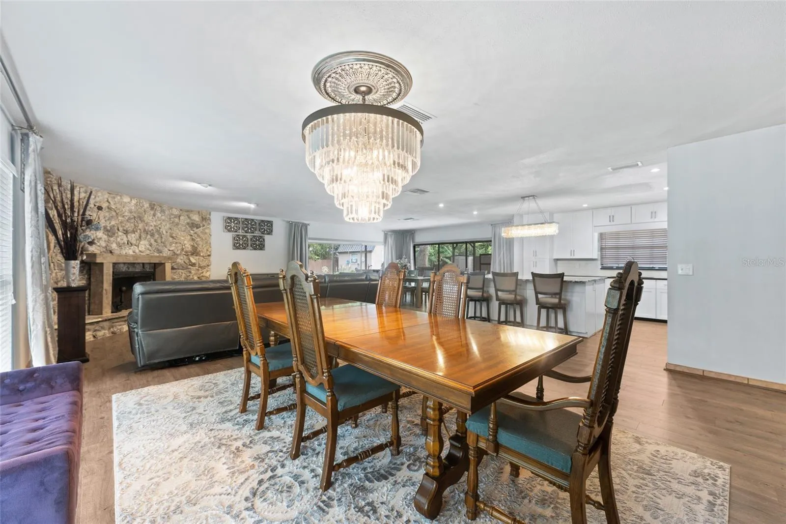 The open-concept living space flows seamlessly to the resort-style backyard, making it an entertainer's dream!
