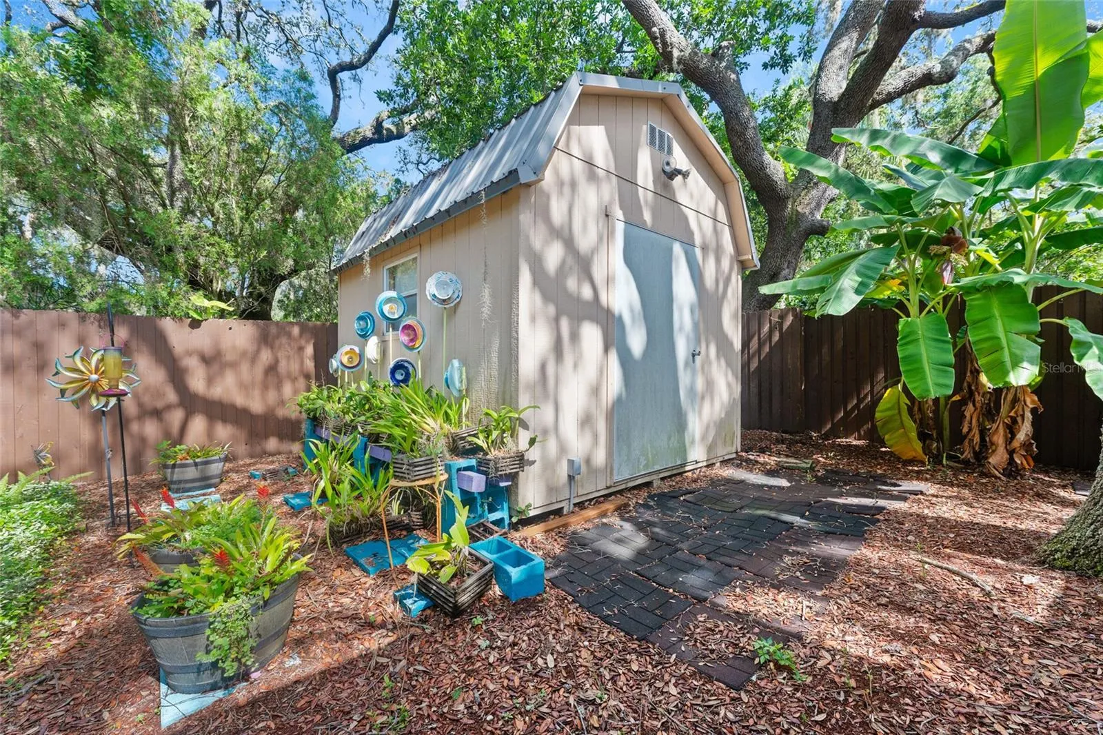A large storage shed adds convenience.