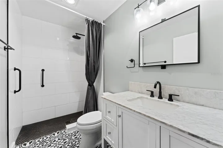 Guest Bathroom has been beautifully updated with stylish finishes and modern fixtures.