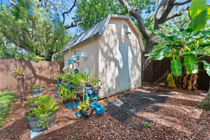A large storage shed adds convenience.