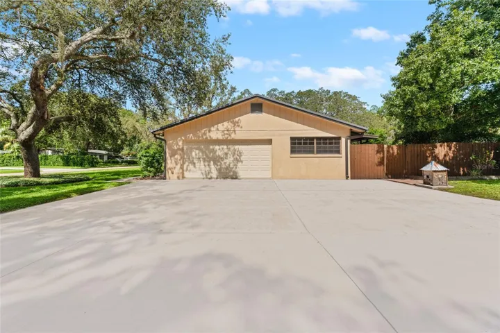 2-car garage and oversized driveway provide ample parking space.
