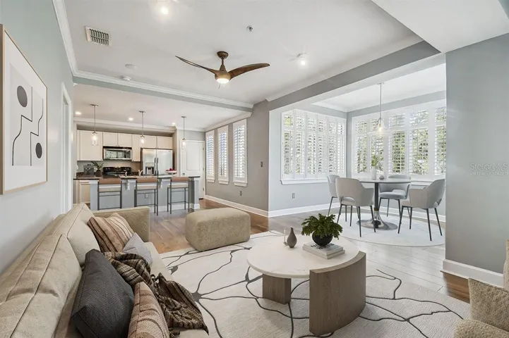 Virtually staged living and dining rooms.