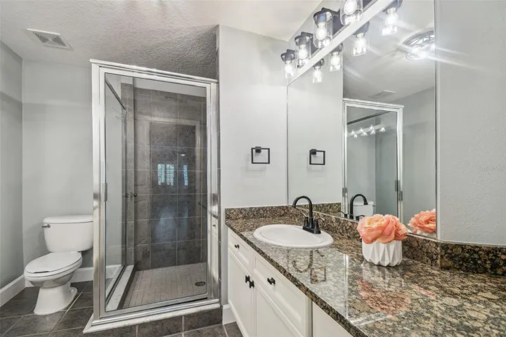 Primary bathroom with double sink vanities.