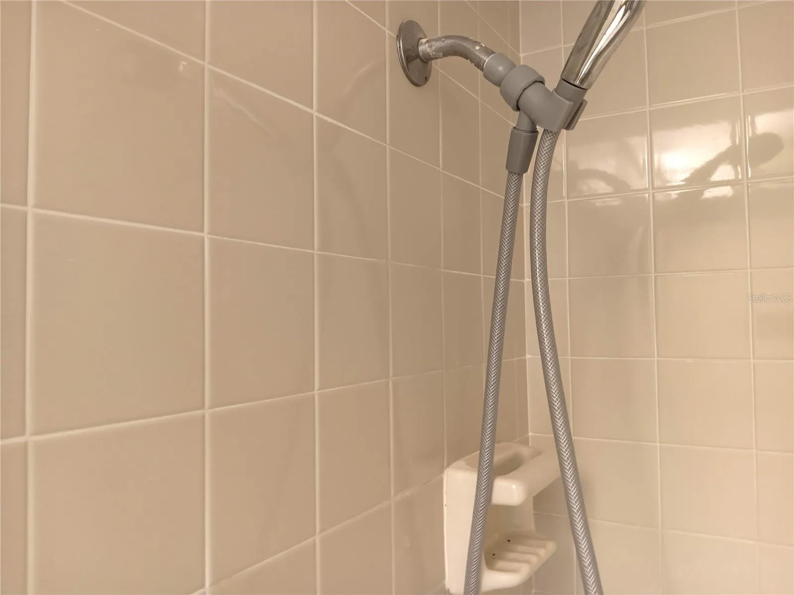 Master bathroom has the shower.  It's tile all the way around.