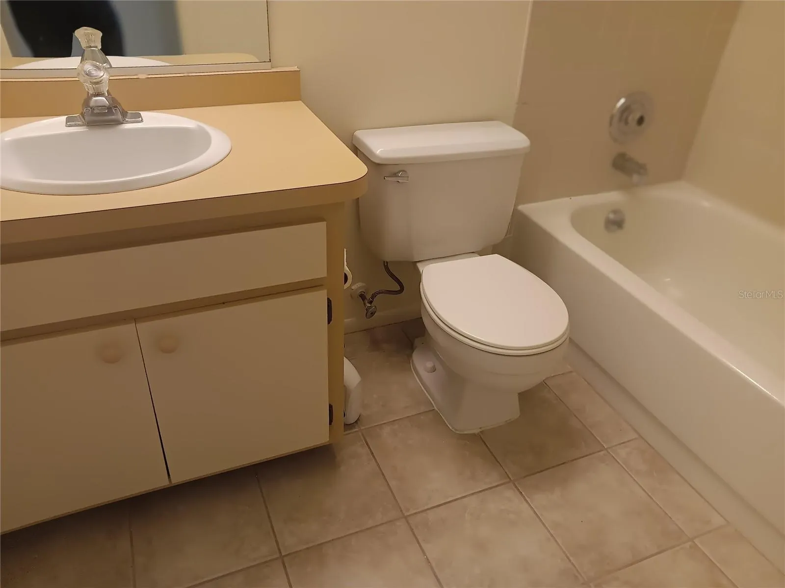 Guest bathroom has a bathtub