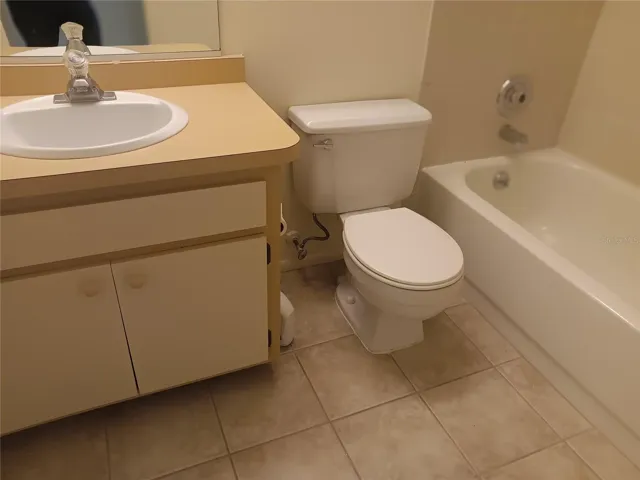 Guest bathroom has a bathtub