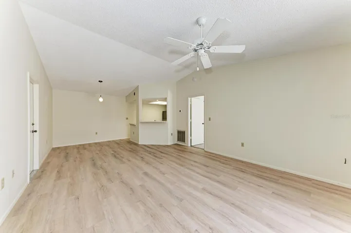 Living room lookng toard the kitchen and dining area.