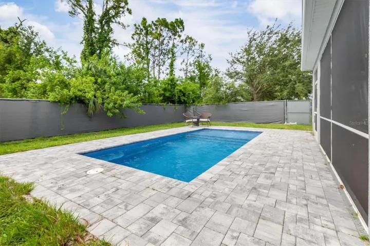 Backyard is perfect for pool parties and BBQ.