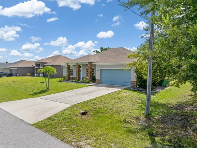 Driveway with room for multiple cars to park.