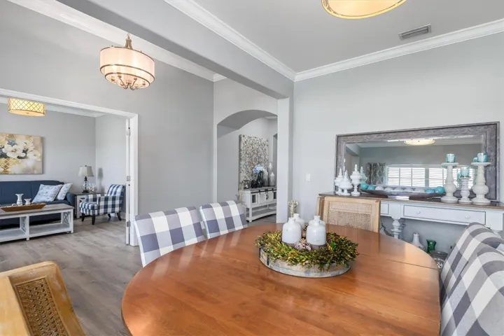 Flexible floorplan with formal dining room and den/office with double glass doors.