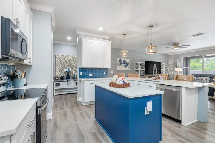 Lots of cabinet space and room for surfaces for meal prep.