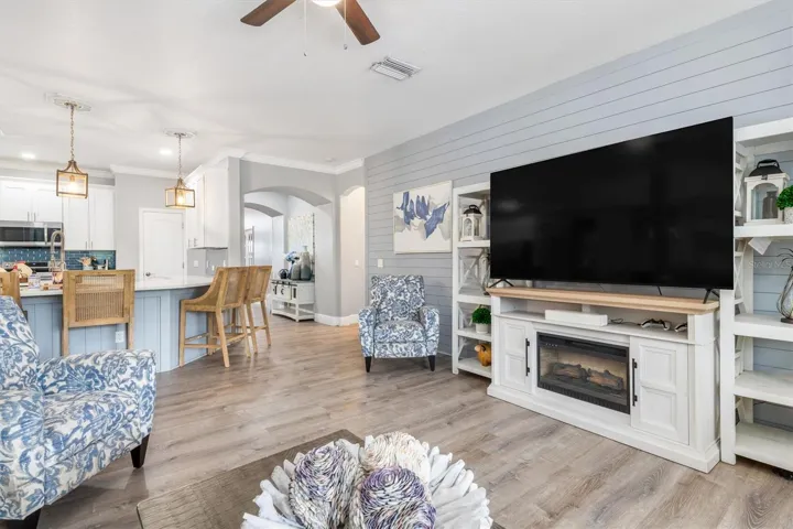 Open floorplan with kitchen and family room at center of the home.