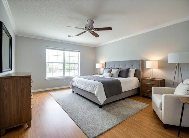 Primary bedroom w/ ensuite