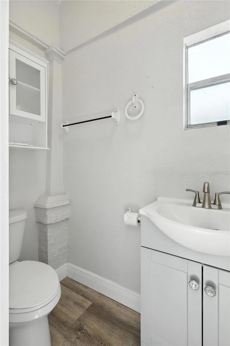 1ST BEDROOM IN THE FRONT ATTACHED BATHROOM