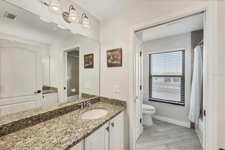 bath 2 dual vanities opposite each other