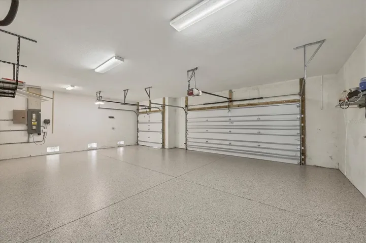 3 car garage with epoxy flake flooring