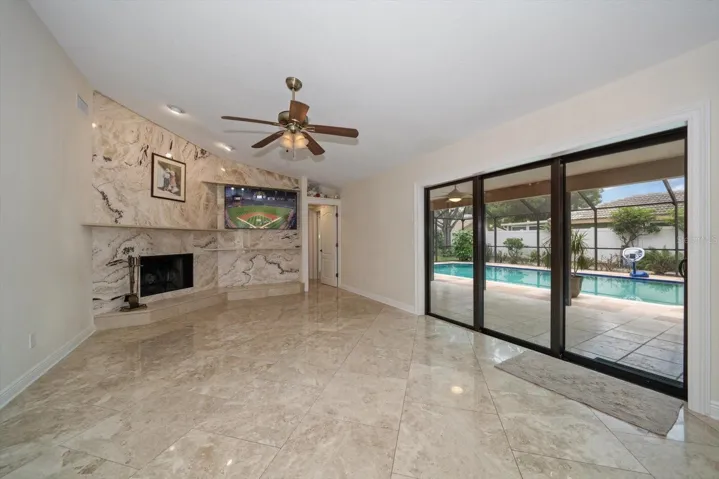 Family Room with Onyx stone surround on FirePlace