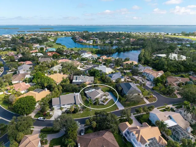This home is nestled in The Bayou neighborhood within the exclusive, double gated Bay Isles community offering exceptional privacy and security.