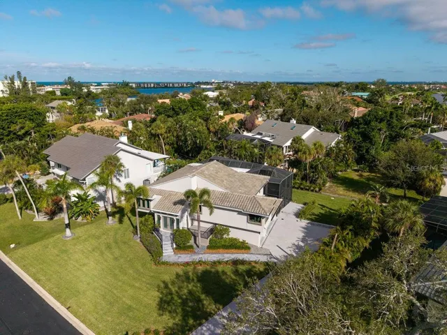 This home is nestled in The Bayou neighborhood within the exclusive, double gated Bay Isles community offering exceptional privacy and security.