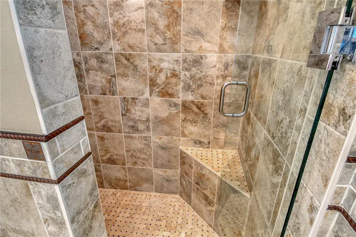Spacious walk in shower adds a great touch for everyday luxury.
