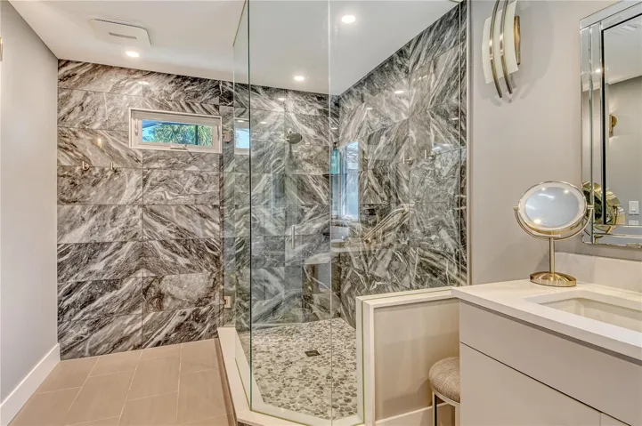 Custom designed walk in tiled shower.