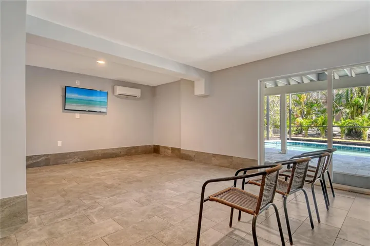 Non conforming lower level family room is cooled and offers plenty of space.