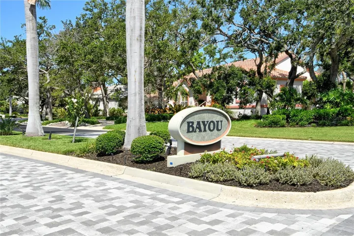 This home is nestled in The Bayou neighborhood within the exclusive, double gated Bay Isles community offering exceptional privacy and security.