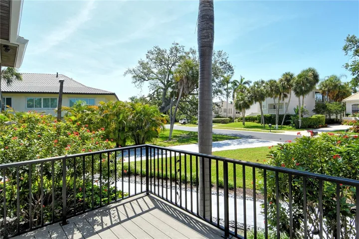 The view from this alcove reveals the fantastic, lush surroundings of The Bayou neighborhood, offering a serene and picturesque backdrop.