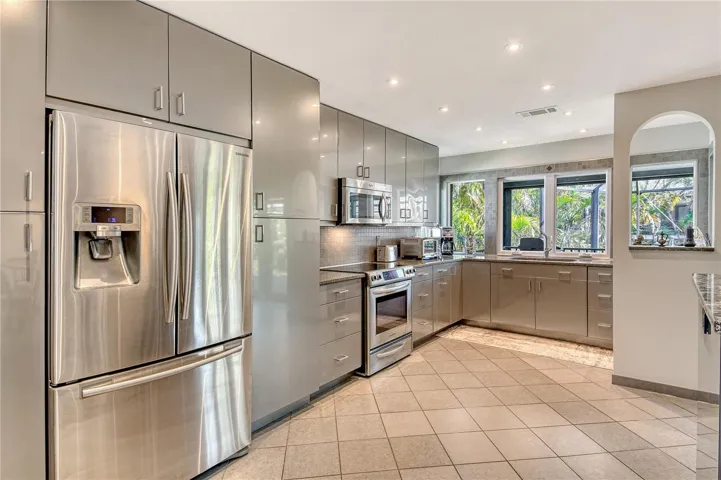 Sleek and modern, house offers premium stainless steel appliances.