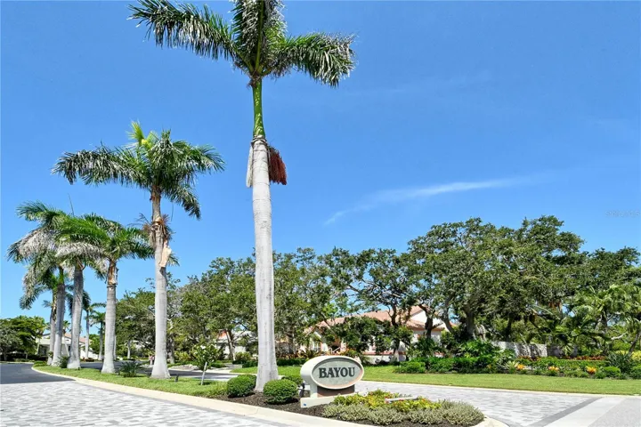 Another view of The Bayou showcases its welcoming charm and manicured landscaping.