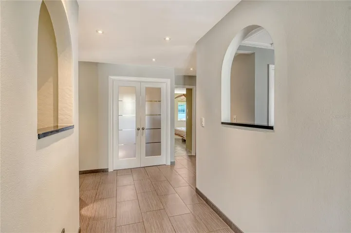Hallway and home are adorned with delightful details that infuse every space with character, charm, and a welcoming sense of personality.