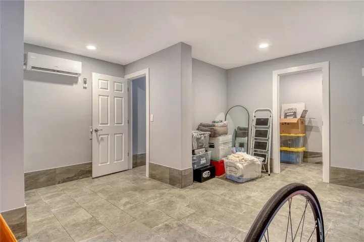 Another room in the non conforming lower level space offers great storage area.