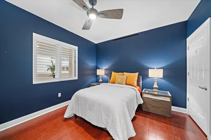 GUEST (or bedroom #2), next to the front door/foyer, opposite the kitchen
