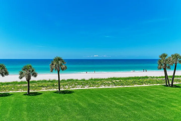View of pristine Gulf waters and seemingly endless beach just outside your back door. *Grass is virtually enhanced.