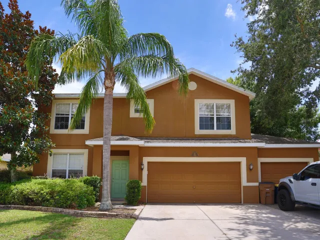 Front of the home with a 3 car garage.