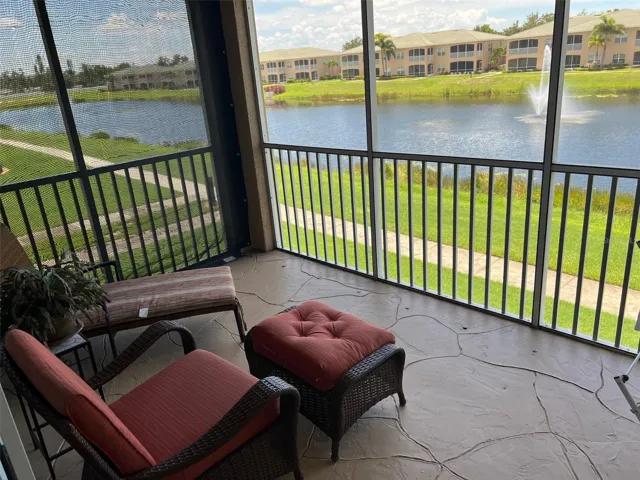 Screened rear balcony with view over 5ac lake.