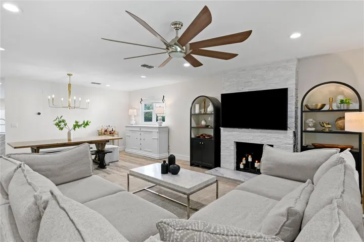 Natural light pours through every corner of the open-concept floor plan creating a warm and welcoming atmosphere.