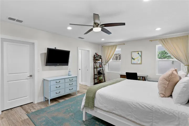 The First Floor Primary Suite offers ultimate flexibility. Perfect as a guest retreat, multigenerational living space, or a bonus room.