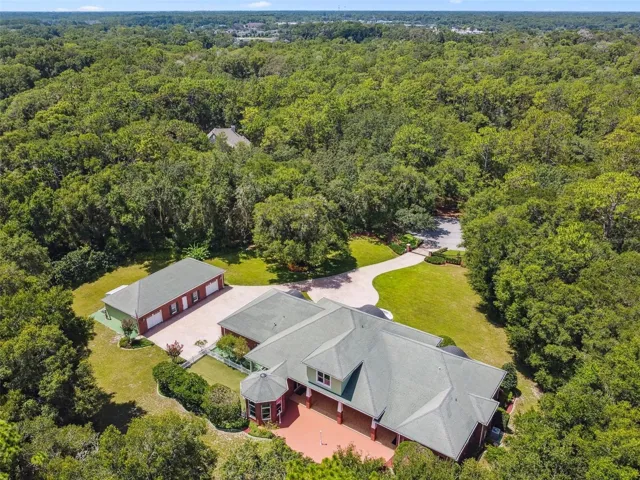 One-of-a-kind estate thoughtfully designed on 2.5 acres of serene land.