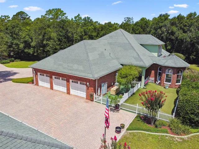 The dog park is a fantastic space to unwind and enjoy quality time with your furry friends. Partially covered by a roof, the entire area features durable artificial turf and secure fencing, creating a safe and welcoming environment for your pets. A ceiling fan in the covered section keeps things cool, while exterior lighting ensures the space is usable even after sunset.