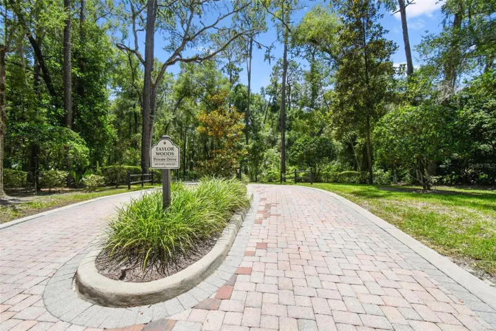 Taylor Woods is a secluded, gated community on the west side of DeLand, featuring a limited collection of custom-built estate homes. Set among mature oaks, pines, and magnolias, the neighborhood offers a peaceful, wooded environment with beautifully landscaped surroundings.