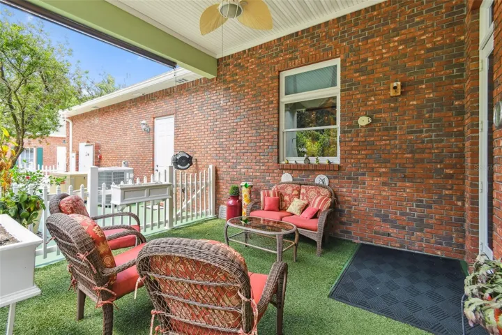The dog park is a fantastic space to unwind and enjoy quality time with your furry friends. Partially covered by a roof, the entire area features durable artificial turf and secure fencing, creating a safe and welcoming environment for your pets. A ceiling fan in the covered section keeps things cool, while exterior lighting ensures the space is usable even after sunset.