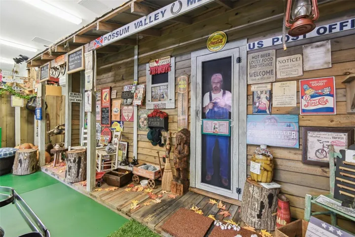 Inside the carriage house, you'll find a personal museum and country store—a spacious area perfect for showcasing your favorite collectibles, memorabilia, or themed displays.
