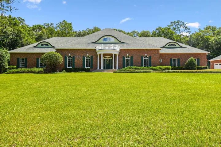 Welcome home to this custom-built private estate, nestled on 2.5 acres at the end of a peaceful cul-de-sac. Surrounded by mature landscaping, fencing, and lush green buffers, it offers exceptional privacy and tranquility.