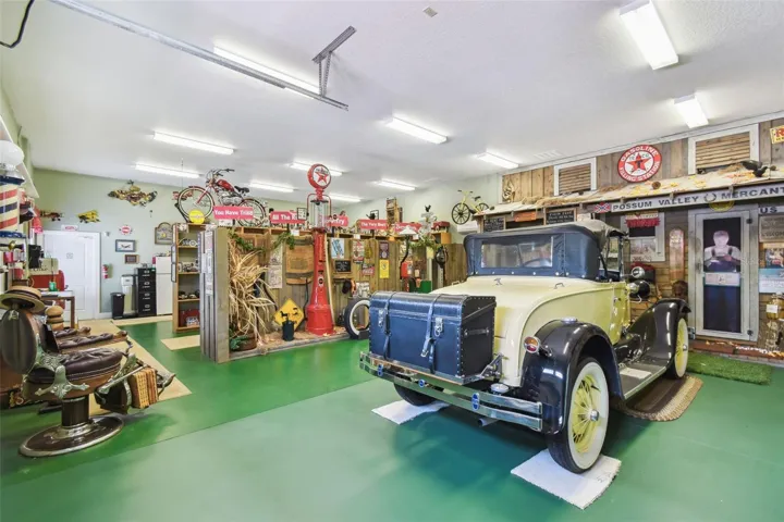Inside the carriage house, you'll find a personal museum and country store—a spacious area perfect for showcasing your favorite collectibles, memorabilia, or themed displays.