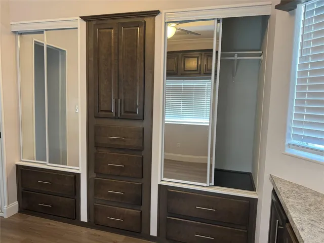 Bedroom with built in drawers & Closet