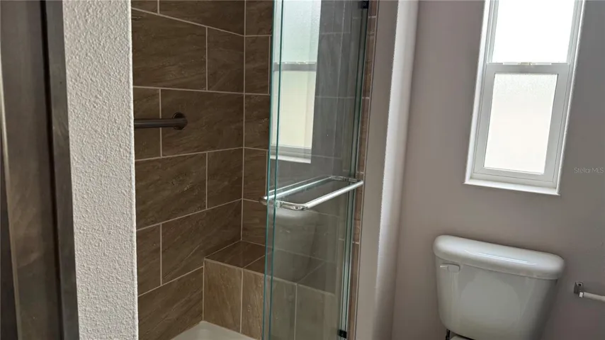 bathroom with Built in Shower Seat