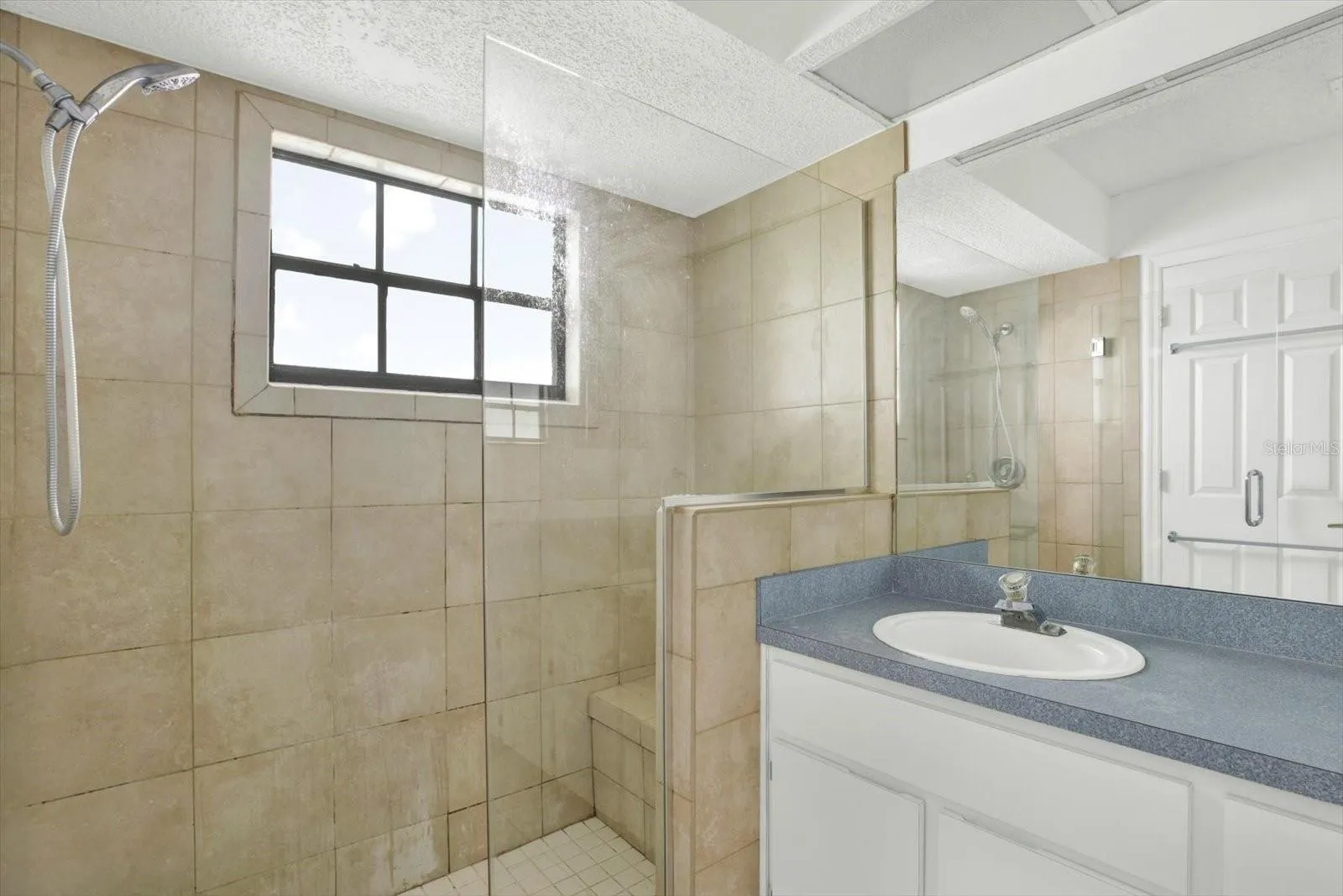 The primary bath's step-in shower.