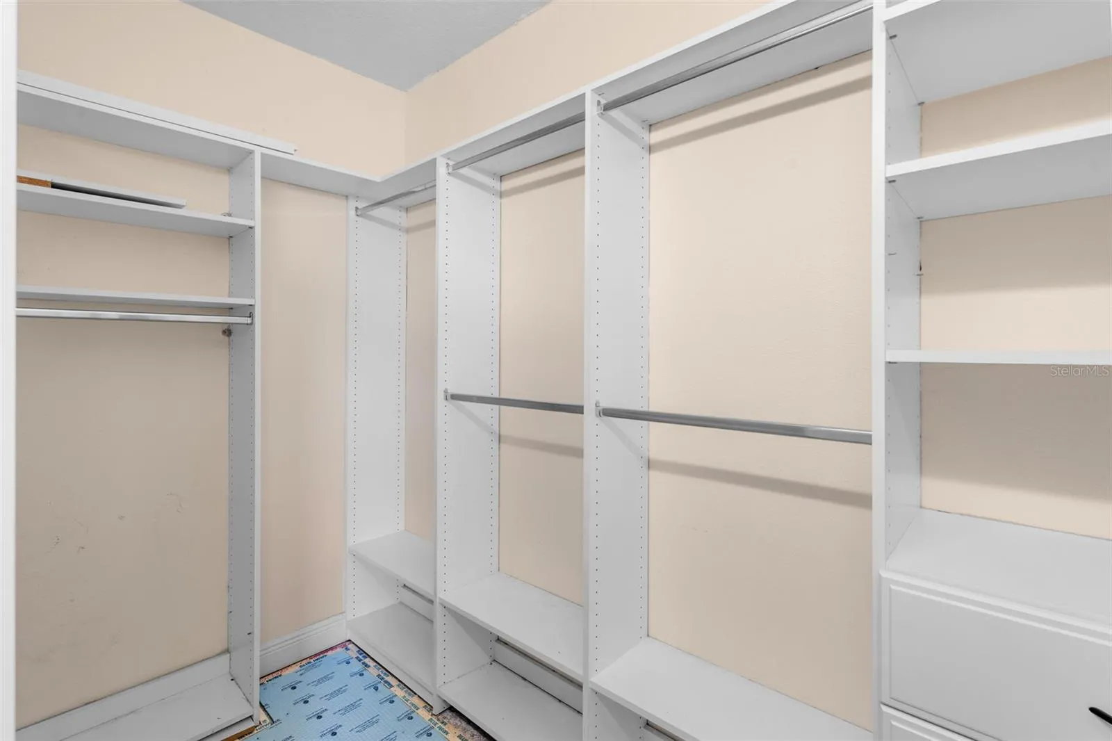 Primary bedroom's walk-in closet